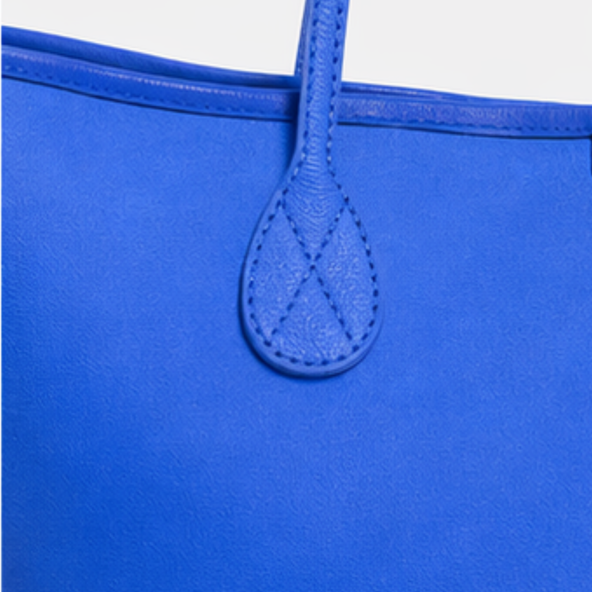 Detalle de ORIGEN tote de piel azul#Color_Azul