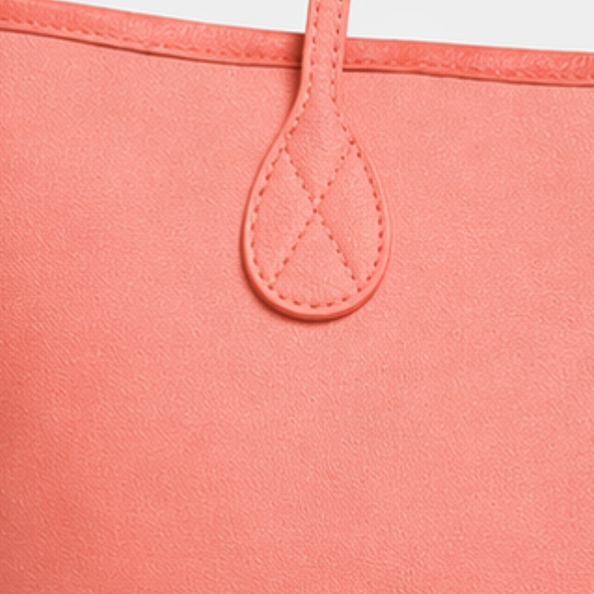 Detalle de ORIGEN tote de piel coral#Color_Coral
